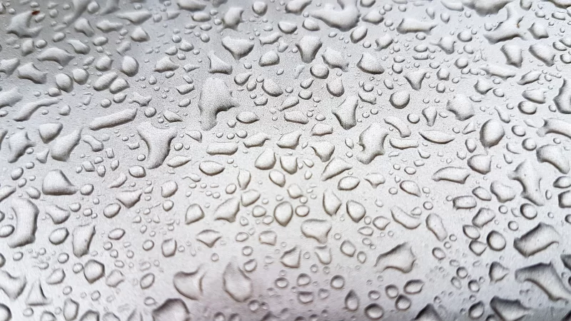 Waterdrops on a grey surface