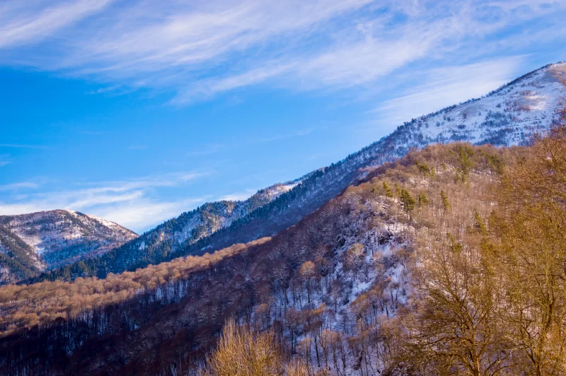 Winter mountains under blue sky