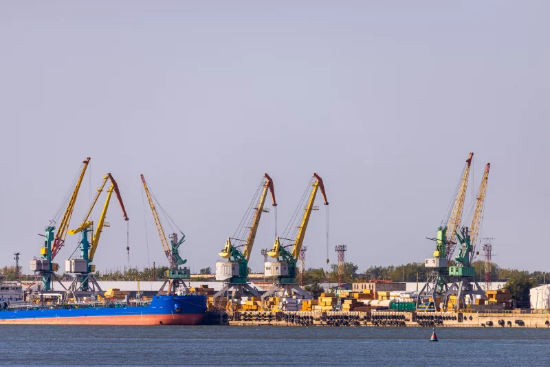 Industrial Port Cranes and Cargo Ship