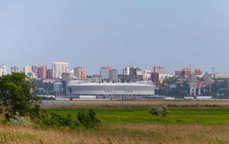 Modern Rostov Arena stadium against a cityscape