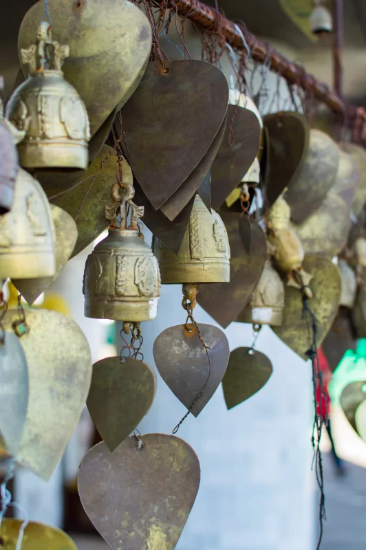 Wish bells and hearts in Buddha temple