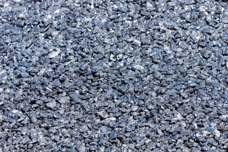 Текстура черного угля или каменного угля в качестве фона