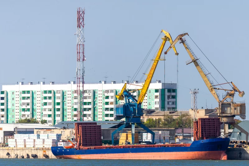 Industrial Port with Cranes and Cargo Ship
