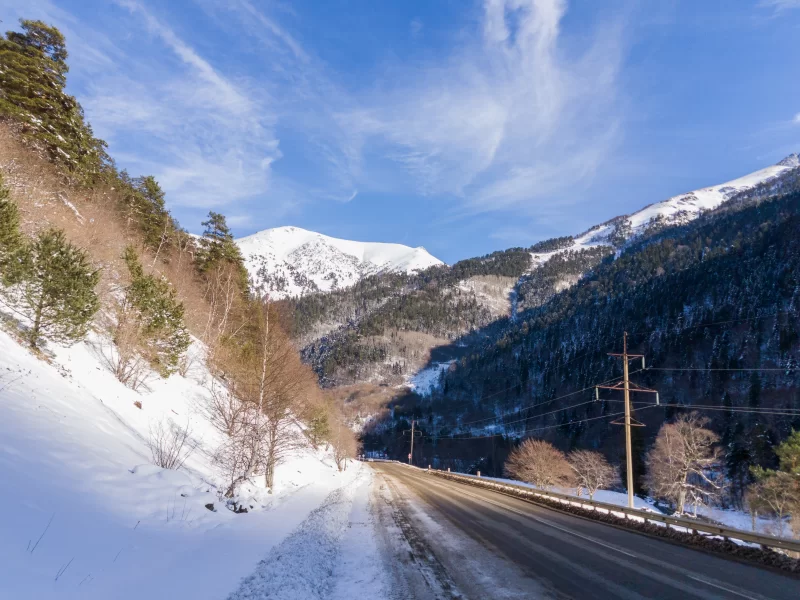 Winter landscape with road in mountains