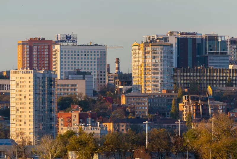 Rostov on Don city panoramic view: modern buildings and sunset sun