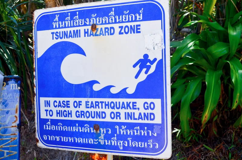Tsunami Hazard Zone Sign with Thai and English Text