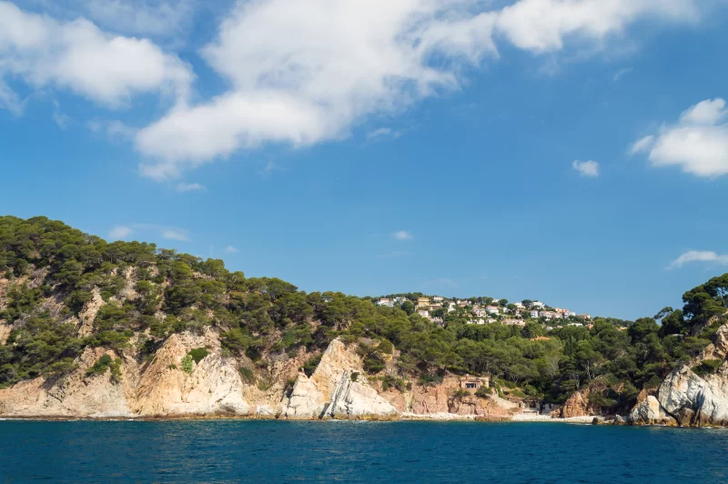 Costa Brava coastal landscape with cliffs and blue sea