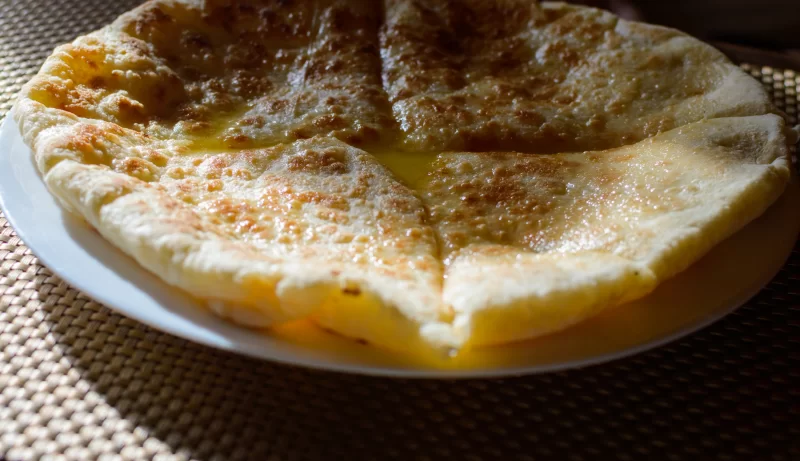 Khachapuri with butter on a plate