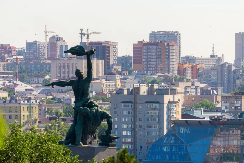 Monument to the 1902 strike in Rostov-on-Don against a city skyline