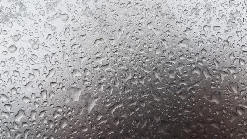Waterdrops on a grey surface