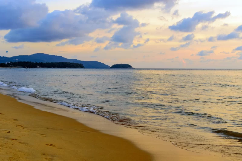 Golden sunrise over tropical beach
