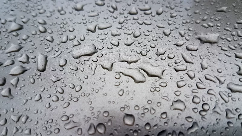 Waterdrops on a grey surface